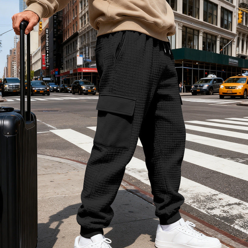Men's waffle texture cargo pants in jogging style with flap pockets and elastic waistband StylebySassy