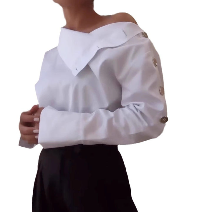 Women high-neck blouse with decorative shoulder buttons and flared cuffs StylebySassy