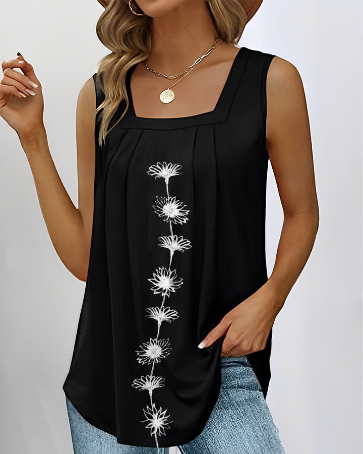 Women's sleeveless long top with square neckline, pleated yoke and central floral print StylebySassy