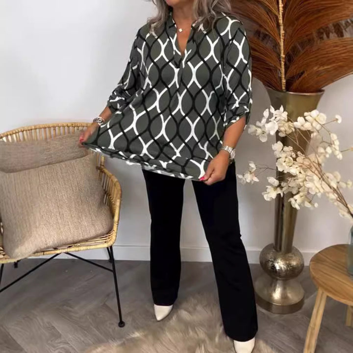 Ladies casual long tunic with V-neck three-quarter sleeves side pockets and geometric chain print StylebySassy