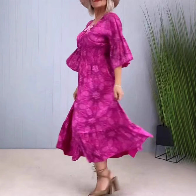 Women's airy midi dress with V-neck, tiered hem, and half-length ruffled sleeves StylebySassy
