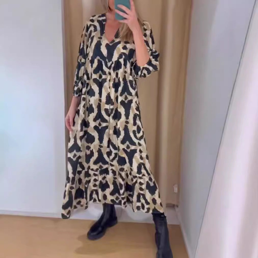 Women's flowing tiered maxi dress with V-neck, gathered bust panel and three-quarter sleeves StylebySassy