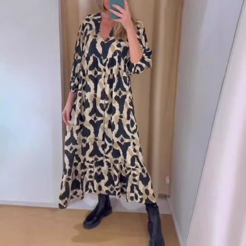 Women's flowing tiered maxi dress with V-neck, gathered bust panel and three-quarter sleeves StylebySassy