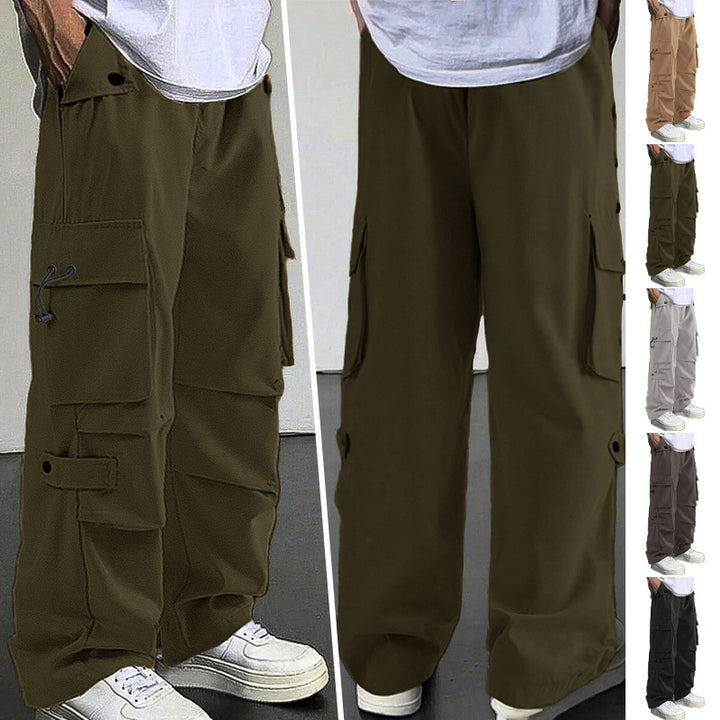 Men's baggy cargo pants with utilitarian flap pockets, drawstring waistband, and reinforced seams StylebySassy