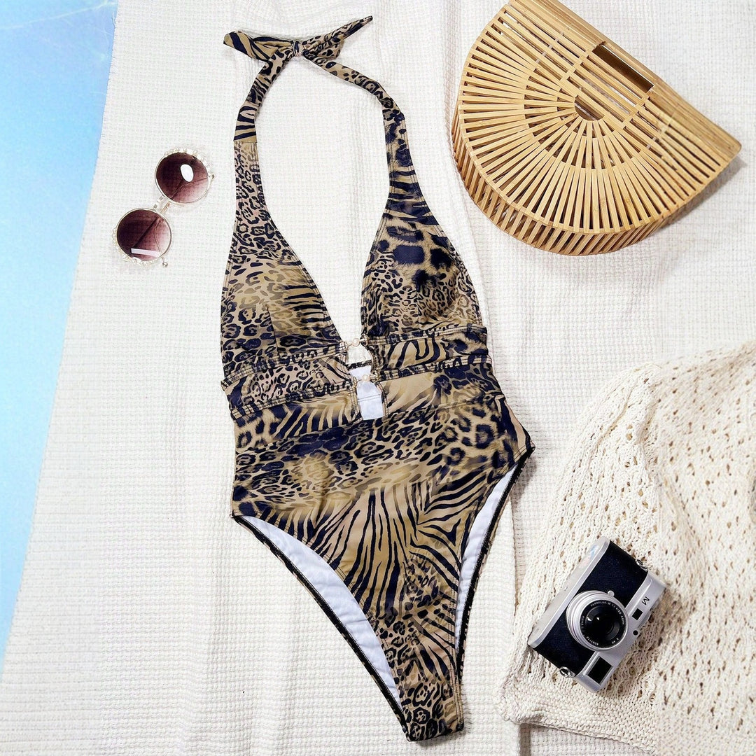 Ladies Premium One-Piece Swimsuit with Deep V-Neck and Elegant Jewelry Details StylebySassy