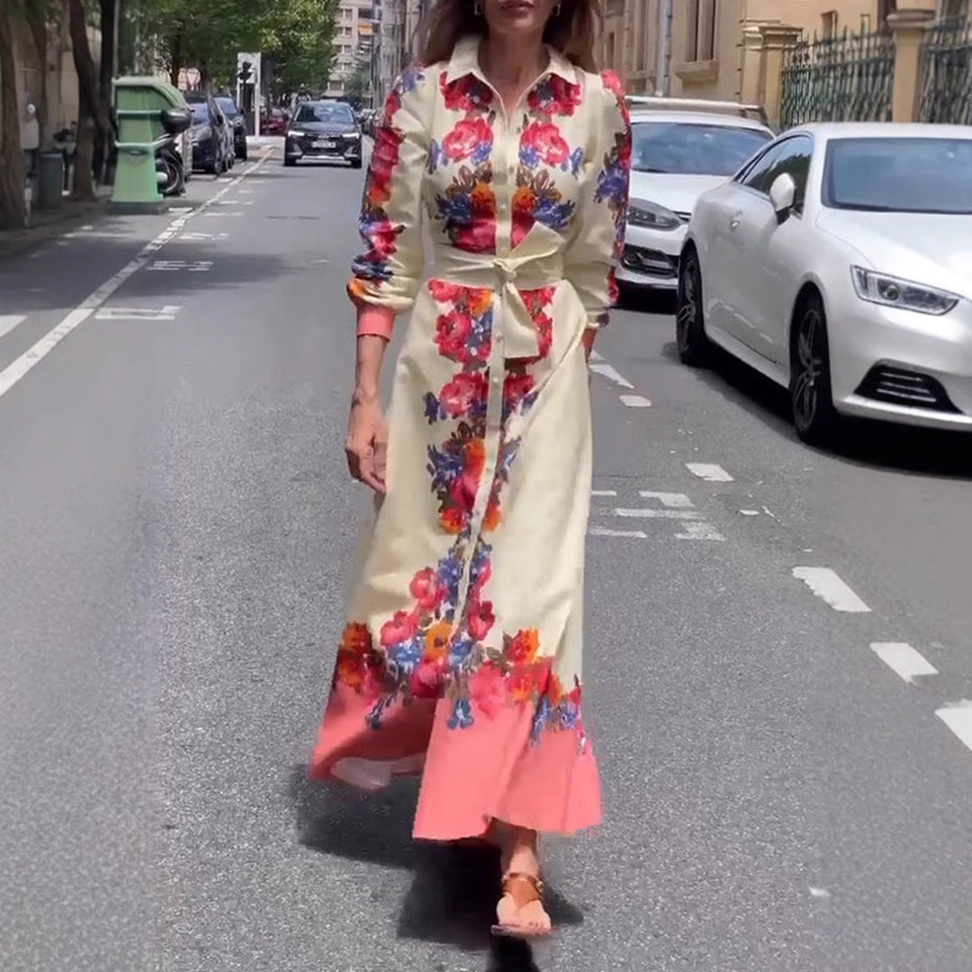 Women's long hem blouse dress with floral print, tie belt, and ruffle trim StylebySassy