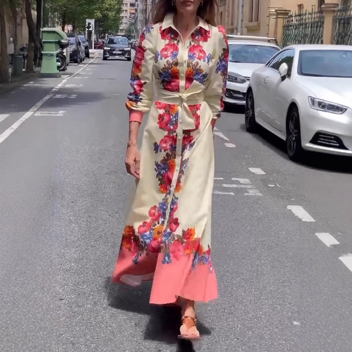 Women's long hem blouse dress with floral print, tie belt, and ruffle trim StylebySassy