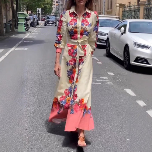 Women's long hem blouse dress with floral print, tie belt, and ruffle trim StylebySassy