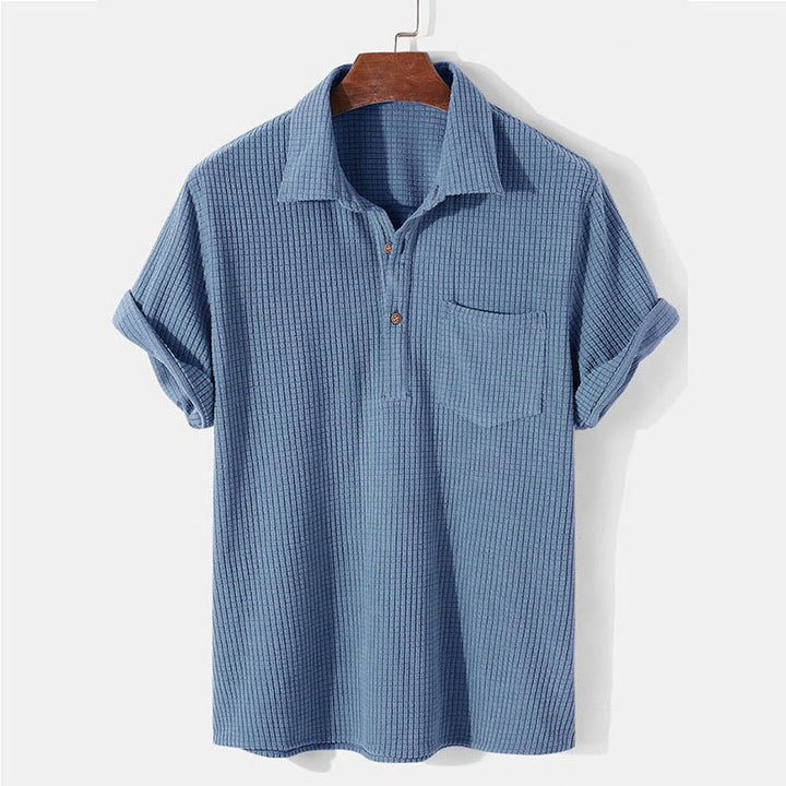 Men's waffle knit polo with shirt collar, short button placket and chest pocket StylebySassy