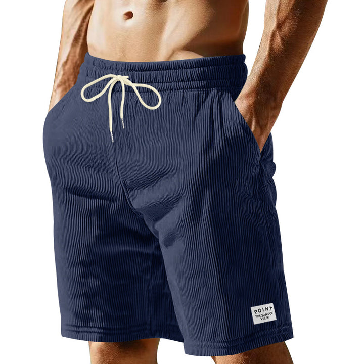 Men's knee-length lounge shorts in ribbed structure jersey with elastic drawstring waistband and patch pockets StylebySassy