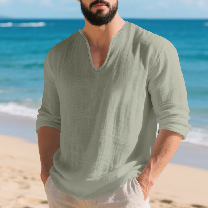 Men's lightweight linen V-neck shirt with a loose fit and roll-up sleeves StylebySassy