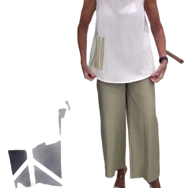 Women's sleeveless blouse top with wide shawl collar, relaxed A-line and side decorative yoke StylebySassy