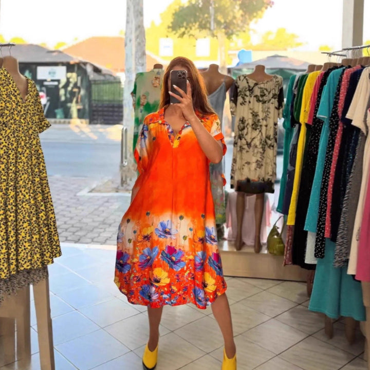 Women's lightweight shirt dress with floral border print, open V-neck and side pockets StylebySassy