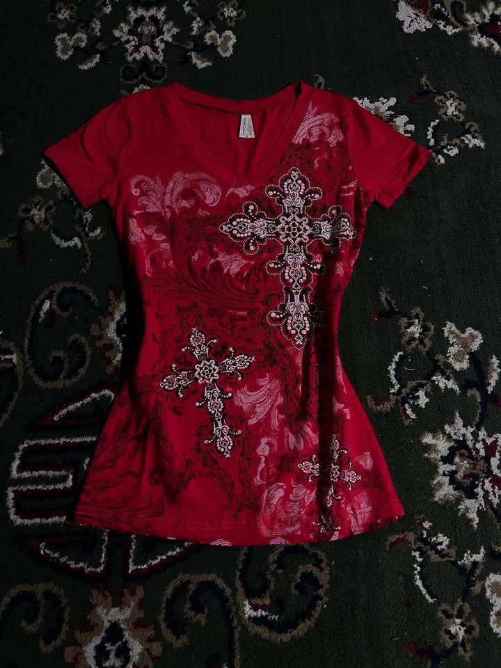 Women's T-shirt with decorative cross design and floral accents StylebySassy