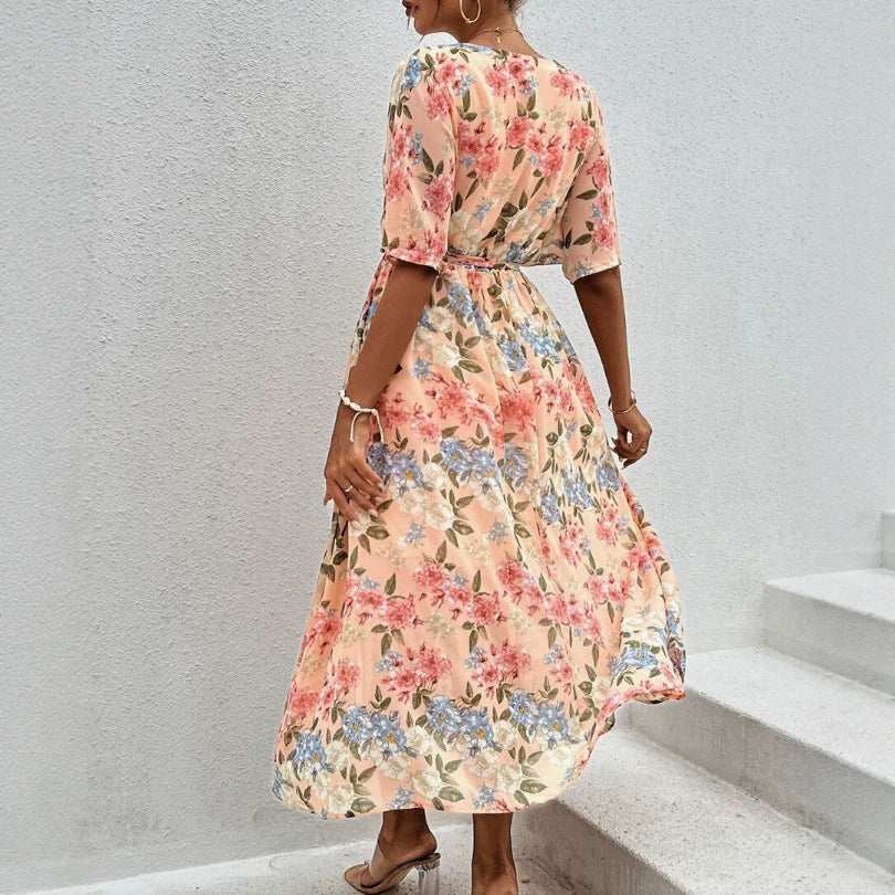 Women's floral V-neck tie dress with fitted belt and side leg slit StylebySassy
