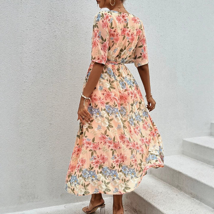 Women's floral V-neck tie dress with fitted belt and side leg slit StylebySassy