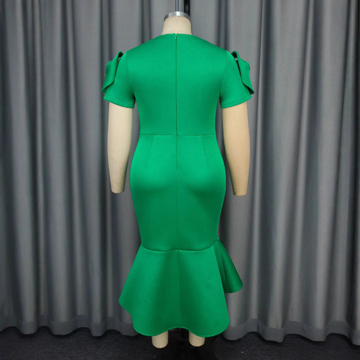 Women's fitted dress with voluminous sleeves and tailored belt detail StylebySassy