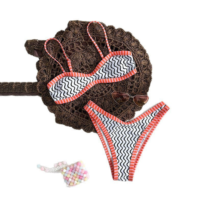 Women's bikini set with textured wave pattern and sporty strap design StylebySassy