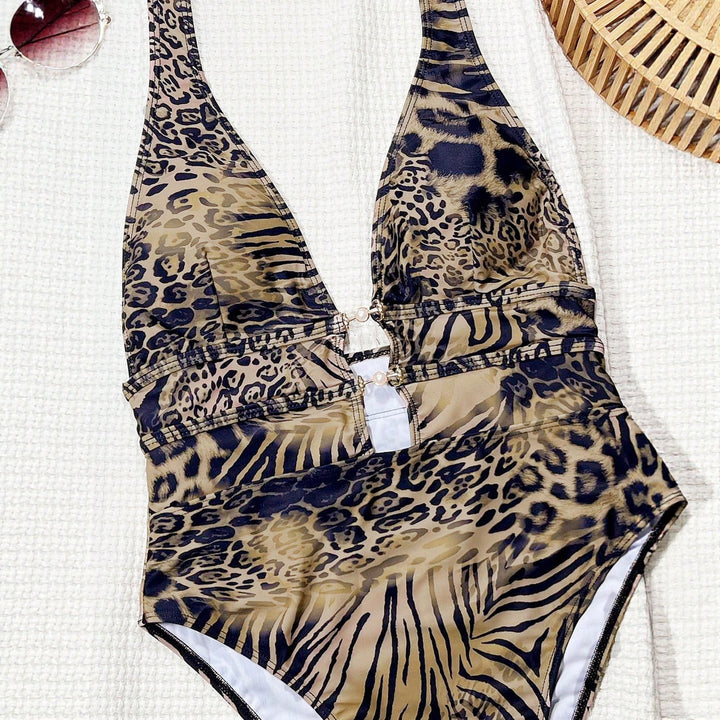 Ladies Premium One-Piece Swimsuit with Deep V-Neck and Elegant Jewelry Details StylebySassy