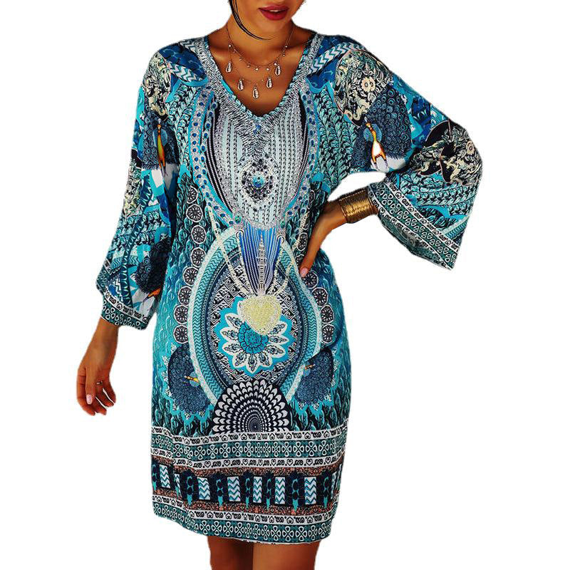 Women's short holiday tunic dress in kaftan style with V-neck and flared kimono sleeves StylebySassy