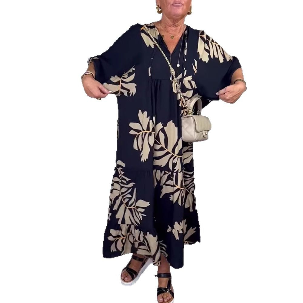 Women’s casual tiered midi dress with V-neck and large floral print StylebySassy