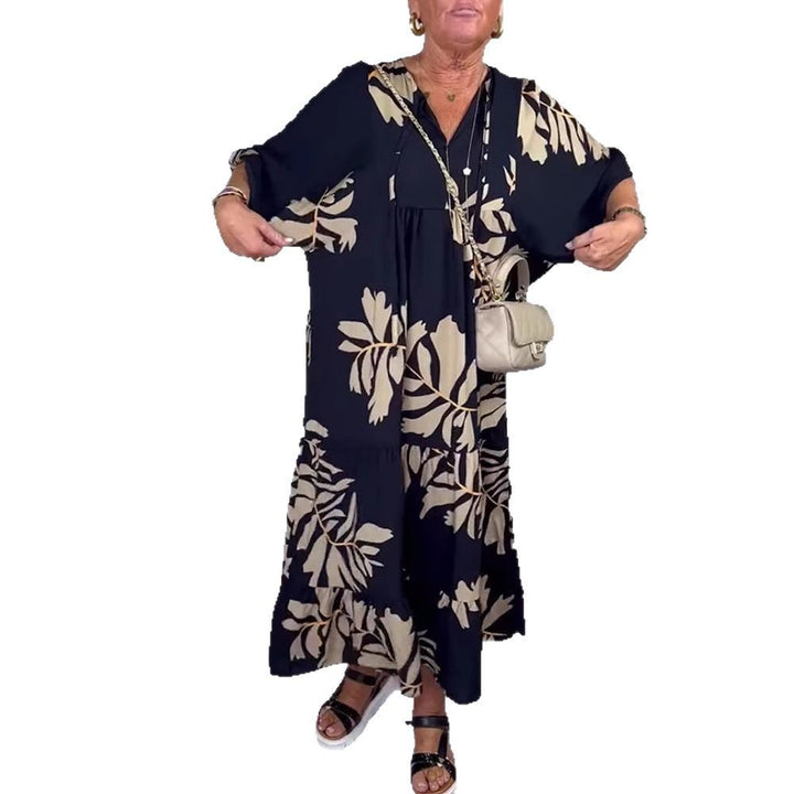 Women’s casual tiered midi dress with V-neck and large floral print StylebySassy