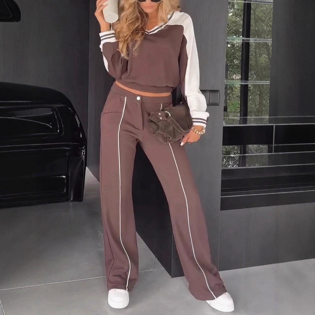 Women's sporty-elegant two-piece set made of cotton blend with V-neck sweatshirt and high-cut flared pants StylebySassy