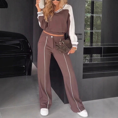 Women's sporty-elegant two-piece set made of cotton blend with V-neck sweatshirt and high-cut flared pants StylebySassy