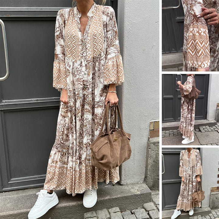 Ladies' tiered maxi dress with ethnic border, stand-up collar, and wide bell sleeves StylebySassy