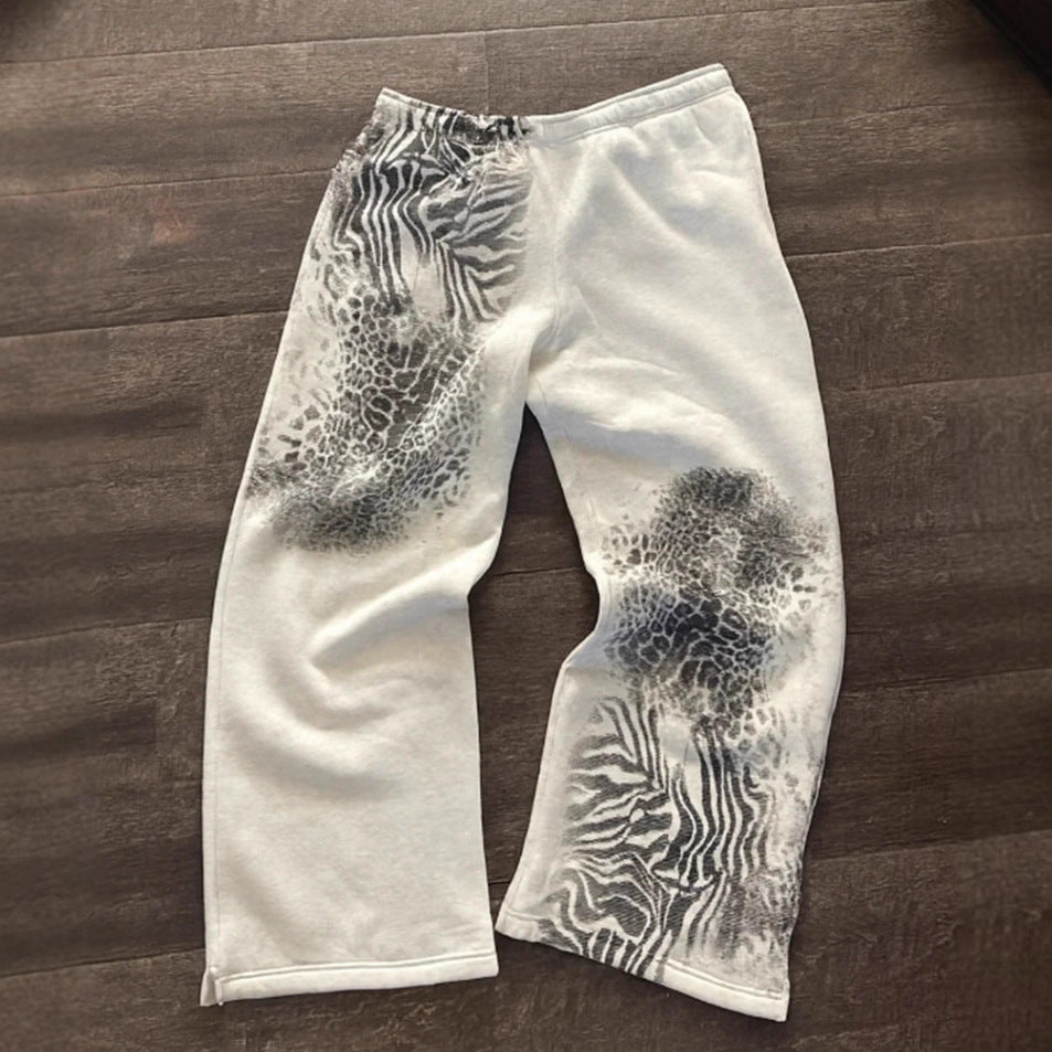 Women nan loose sweatpants with asymmetrical animal print, elastic comfort waistband and straight leg StylebySassy