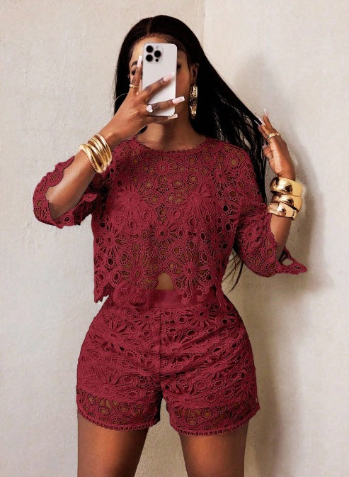 Women's airy crochet two-piece set with floral lace, short top and high-waisted tailored pants StylebySassy