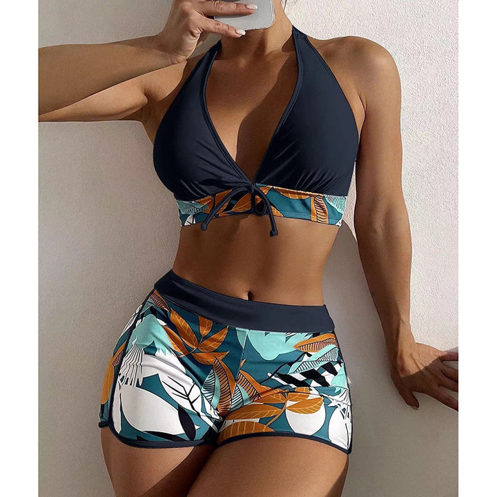 Women's bikini set with sporty high-waist cut and playful floral pattern StylebySassy