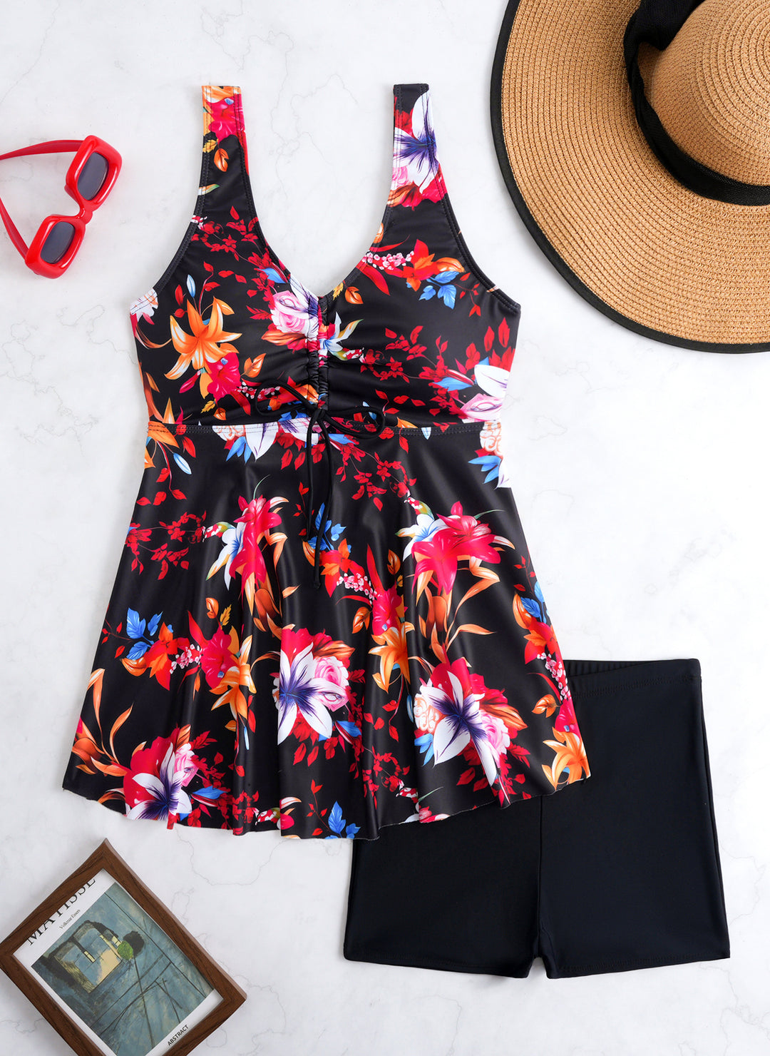 Ladies' tankini set with stylish ruffle and graphic peacock pattern StylebySassy
