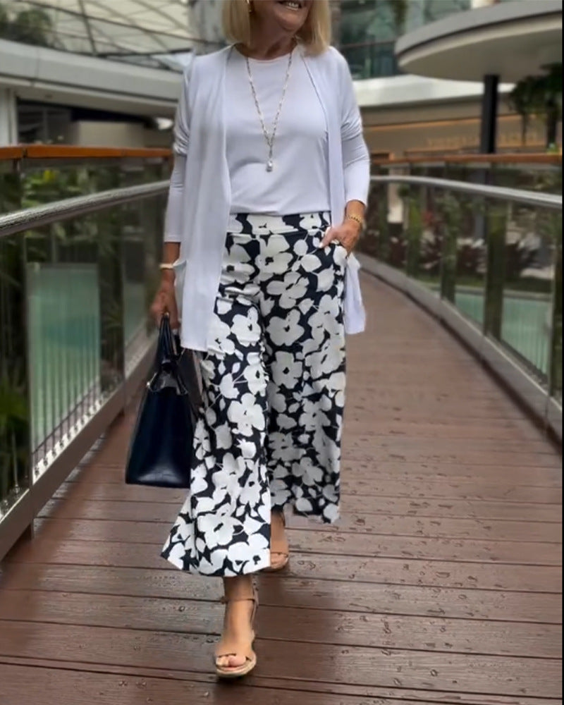 Women's wide Palazzo pants with large floral print, high waistband and side pockets StylebySassy