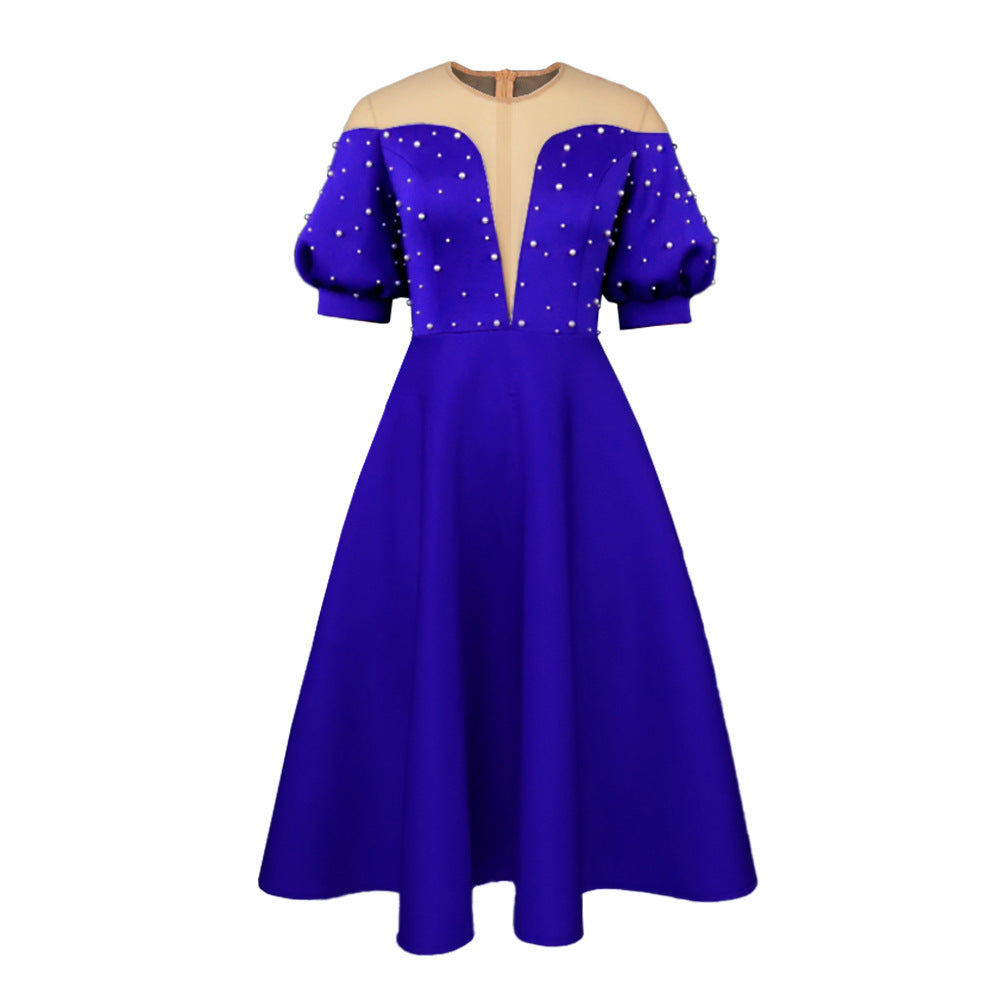 Women's festive midi dress with ruffled sleeves and shimmering accents StylebySassy