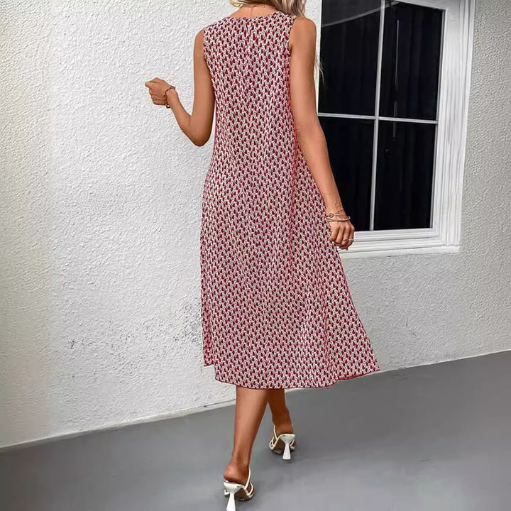 Women’s sleeveless A-line midi dress with round neckline, side leg slit, and fine geometry print StylebySassy