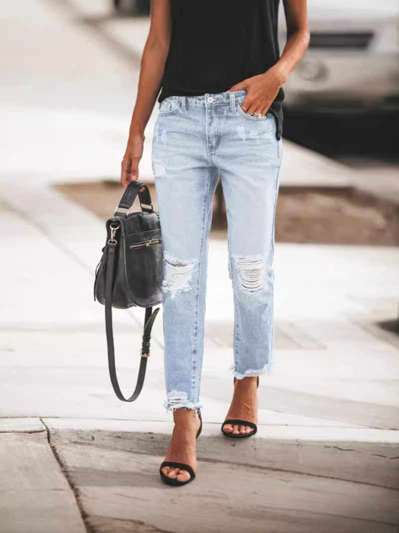 Ladies Ripped Denim Jeans with relaxed fit and frayed hem StylebySassy