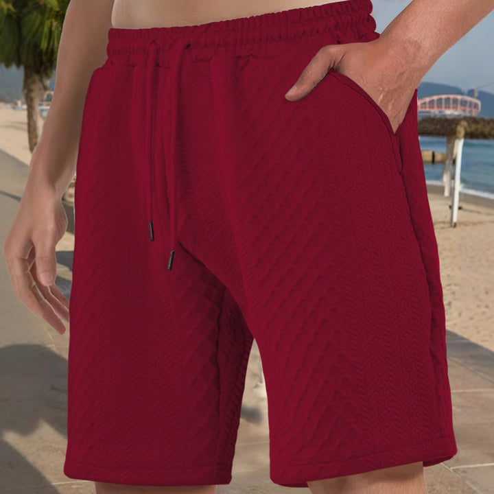 Men's textured beach bermuda shorts made of waffle jersey with elastic drawstring waistband and slanted pockets StylebySassy