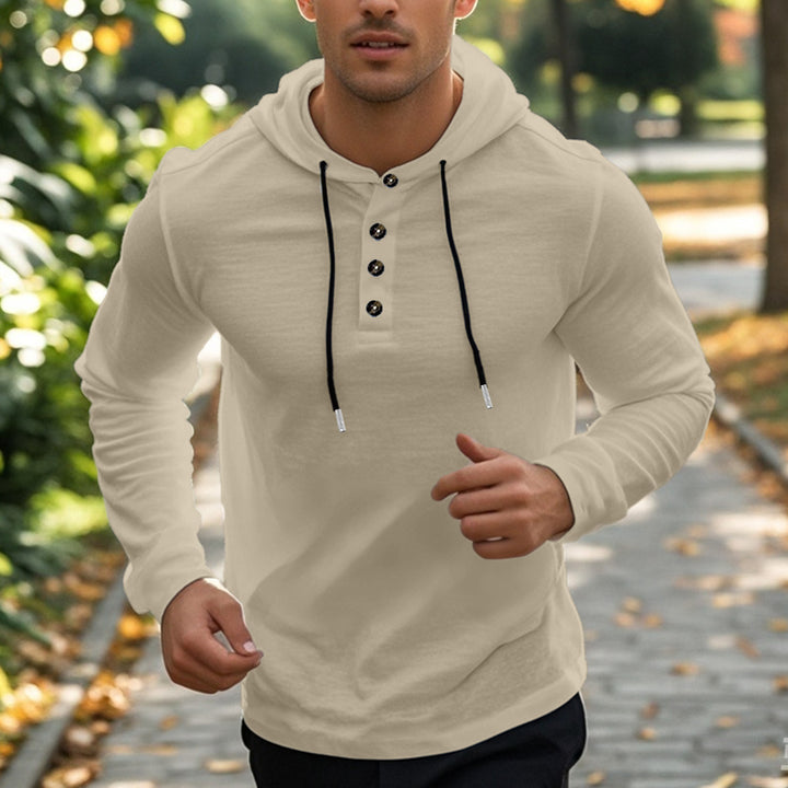 Men's casual hoodie in Henley style with button placket and adjustable drawstring StylebySassy