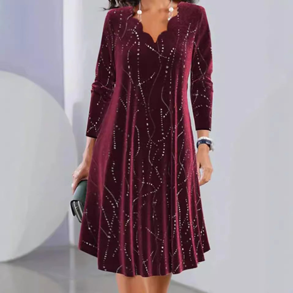 Women's nano velvet A-line dress with curved neckline, long sleeves, and rhinestone embellishment StylebySassy