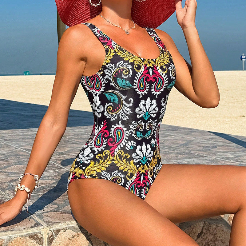Ladies' one-piece swimsuit with floral and graphic accents StylebySassy