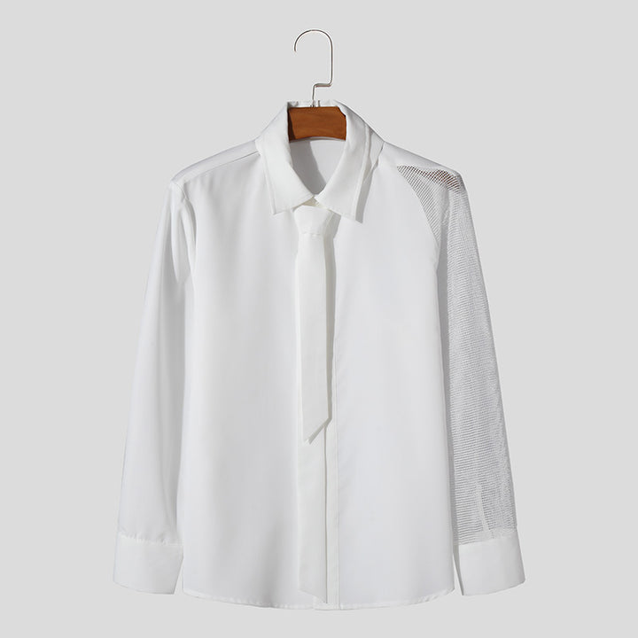Women’s flowing blouse with attached bow, concealed button placket, and one-sided mesh sleeve detail StylebySassy