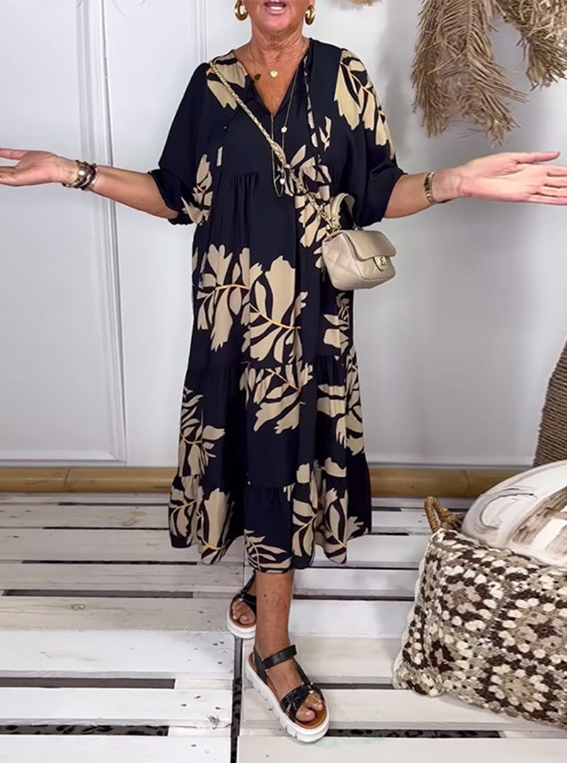 Women’s casual tiered midi dress with V-neck and large floral print StylebySassy