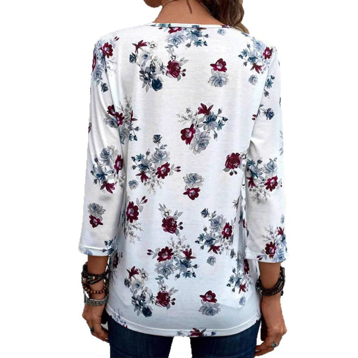 Women's floral tunic blouse with pleats and decorative button placket StylebySassy
