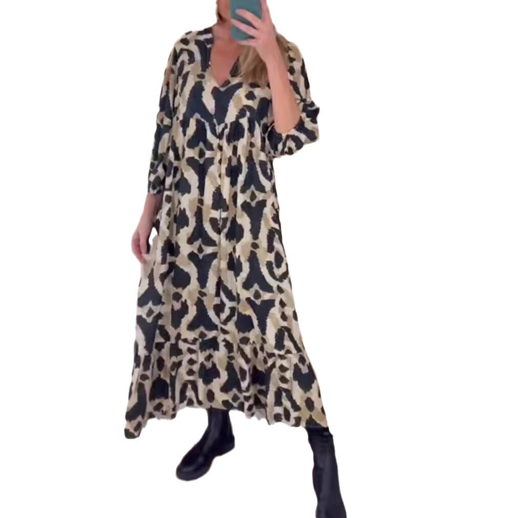 Women's flowing tiered maxi dress with V-neck, gathered bust panel and three-quarter sleeves StylebySassy