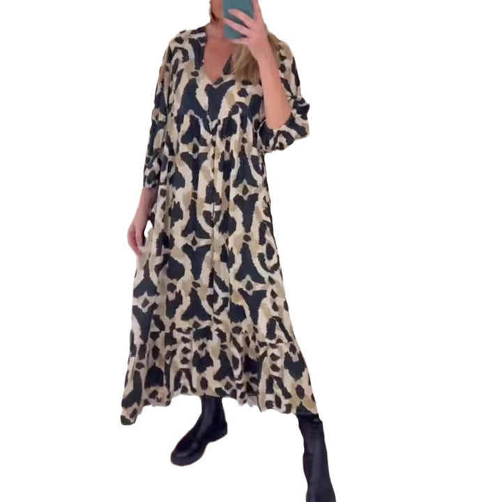 Women's flowing tiered maxi dress with V-neck, gathered bust panel and three-quarter sleeves StylebySassy