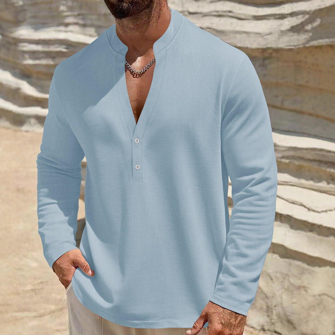 Men's loose-fitting tunic shirt with mandarin collar, two-button Henley placket, and light texture StylebySassy