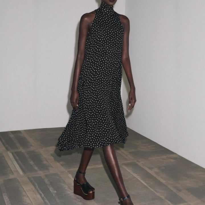 Women's sleeveless midi dress with high stand-up collar, flared ruffle skirt and polka dot pattern StylebySassy