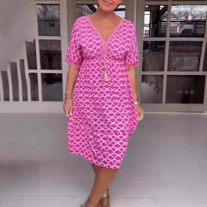 Women's casual V-neck beach dress with tassel tie and ruffle skirt StylebySassy