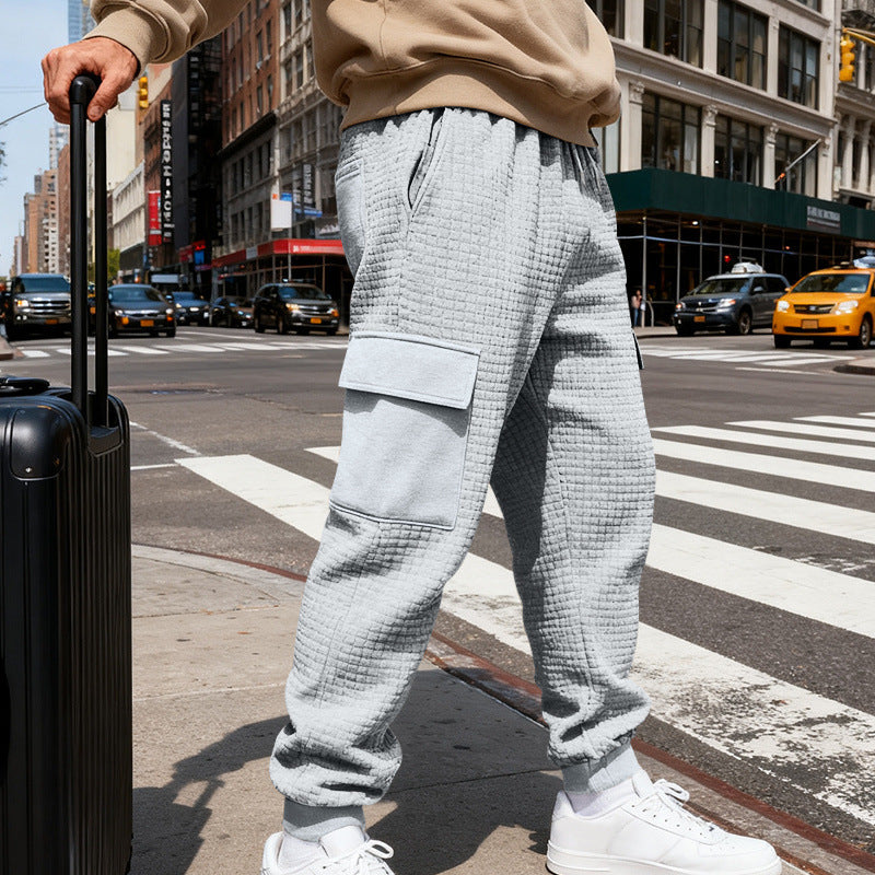Men's waffle texture cargo pants in jogging style with flap pockets and elastic waistband StylebySassy